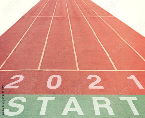 Start and numbers 2021 on a treadmill. Get started for success in the new year.