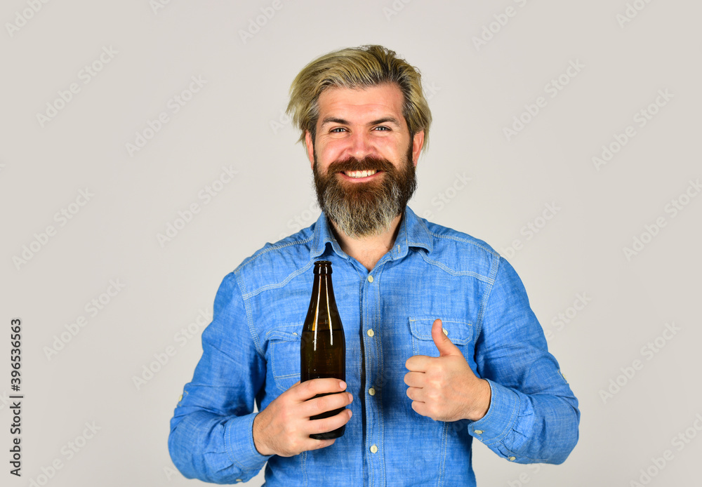 Cold beverage. Drinking beer good for your mood. Making Homemade Kombucha. Refreshing lemonade. Soda drink. Hipster at bar. Man beard and mustache hold bottle. Alcohol drink. Sparkling water drink Cold beverage. Drinking beer good for your mood. Making Homemade Kombucha. Refreshing lemonade. Soda drink. Hipster at bar. Man beard and mustache hold bottle. Alcohol drink. Sparkling water drink