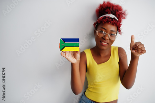 Brazilian woman with afro hair hold Amapa flag isolated on white background, show thumb up. States of Brazil concept. photo