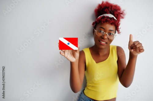 Brazilian woman with afro hair hold Para flag isolated on white background, show thumb up. States of Brazil concept. photo