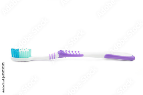 Violet toothbrush isolated on a white background