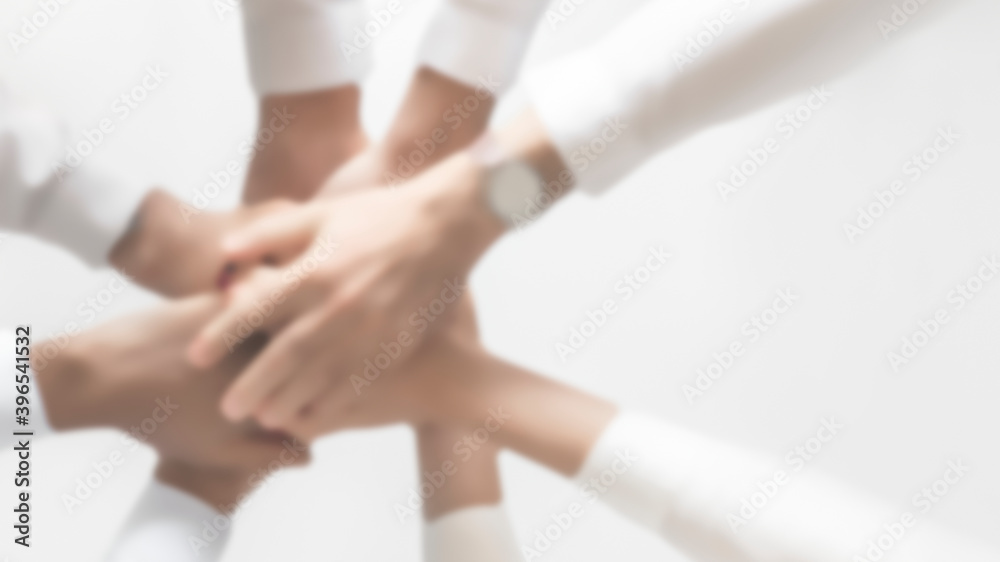 Successful business teamwork joining hands Successful business teamwork joining hands