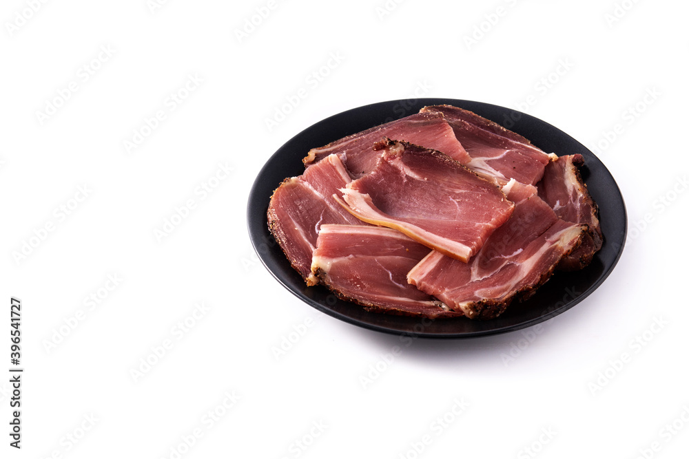Dried and smoked meat slice isolated on white background.Copy space Dried and smoked meat slice isolated on white background.Copy space
