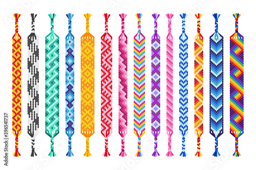 Vector set of multi-colored handmade hippie friendship bracelets of threads isolated on white background.