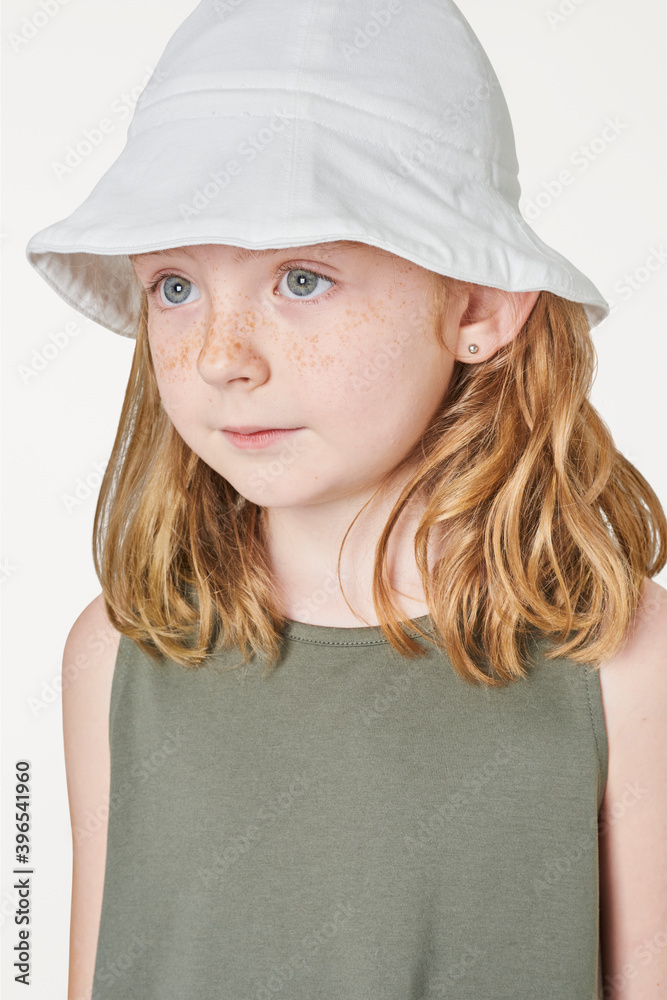 Girl wearing tank top and bucket hat Girl wearing tank top and bucket hat