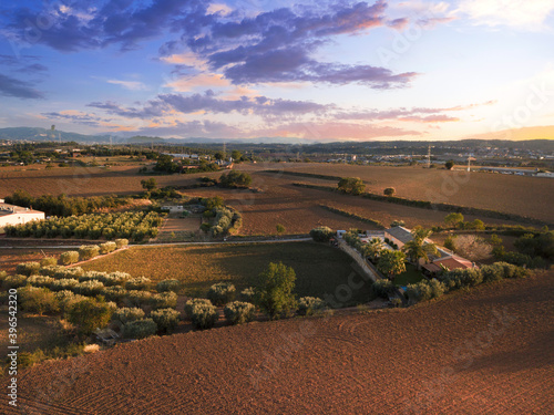 Aerial drone view of countryside fields in Catalonia, Spain. Food production concept and empty copy space for Editor's text.
