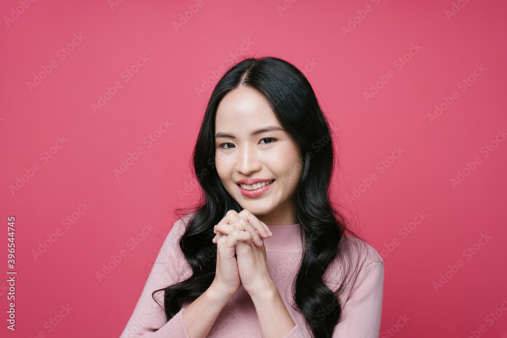 Close up portrait of asian woman black hair isolate on pink background. Close up portrait of asian woman black hair isolate on pink background.