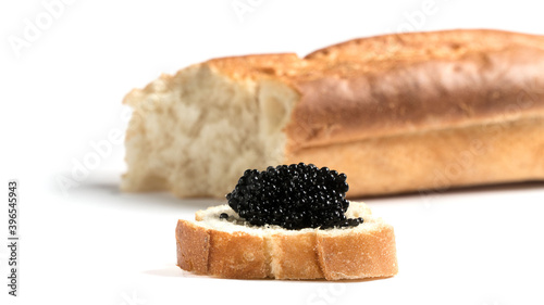  black caviar and bread on a white background