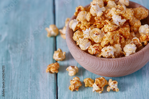 caramelized popcorn on turquoise surface