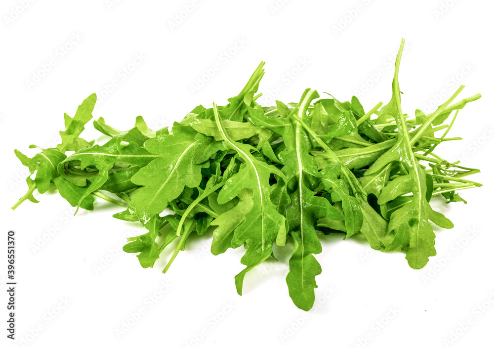 Heap of Green fresh rucola or arugula leaf isolated on white background Heap of Green fresh rucola or arugula leaf isolated on white background