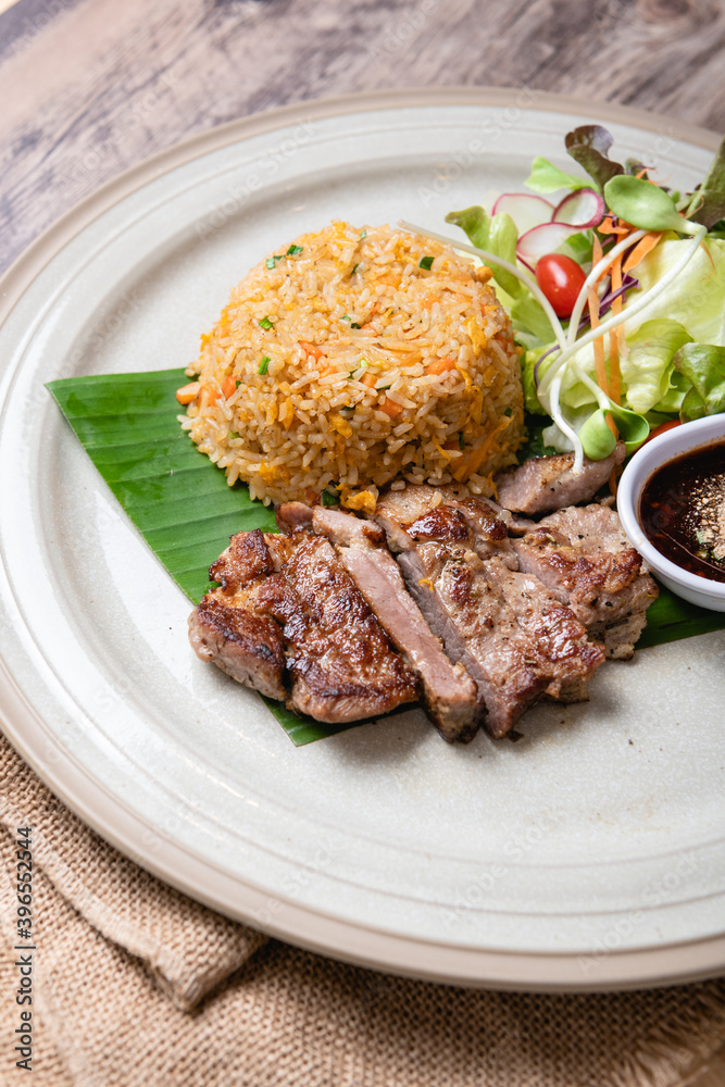 Fried Crispy Pork On a white plate- Thai food style
Fried Crispy Pork On a white plate- Thai food style