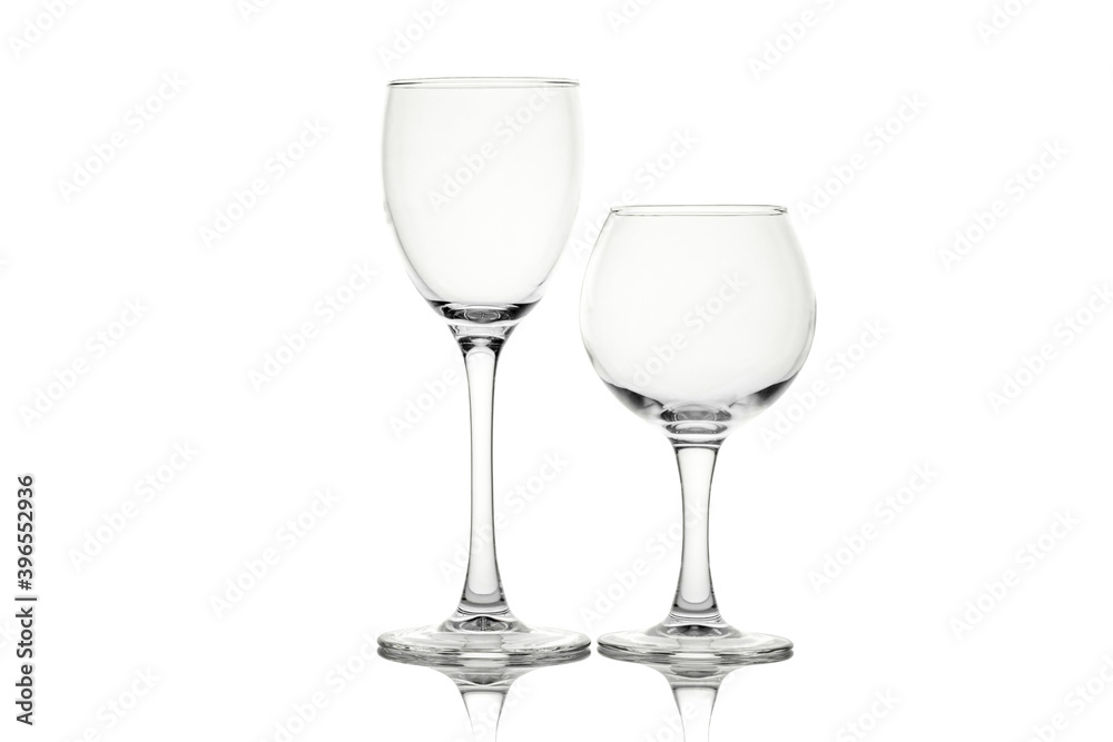 Two empty wine glasses isolated on white background