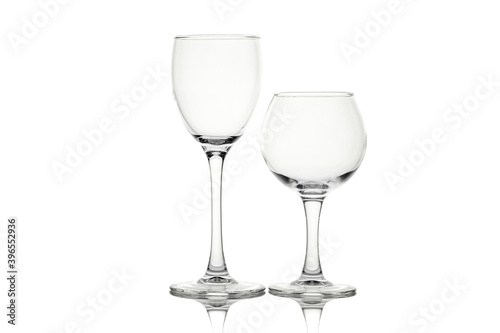 Two empty wine glasses isolated on white background