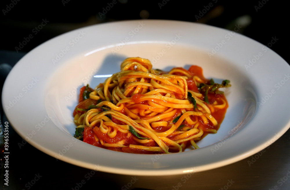 Pasta in Italian restaurant. 
Spaghetti with background