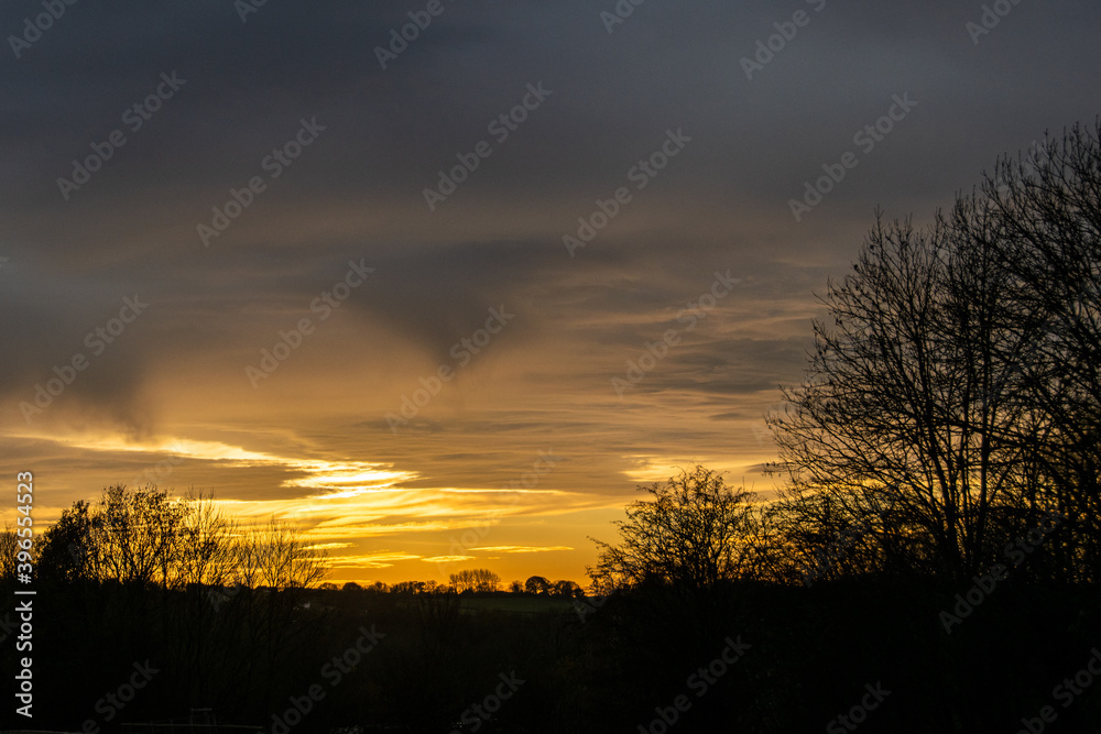 Fototapeta premium a Sunset with rainclouds