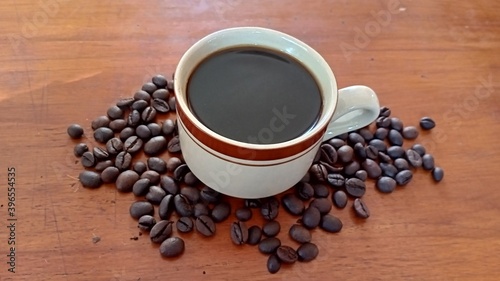 Fototapeta Naklejka Na Ścianę i Meble -  cup of coffee and coffee bean