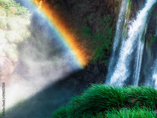 rainbow over the earth iguazu falls 