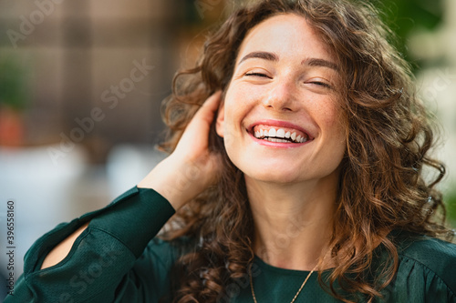 Young beautiful woman laughing photo