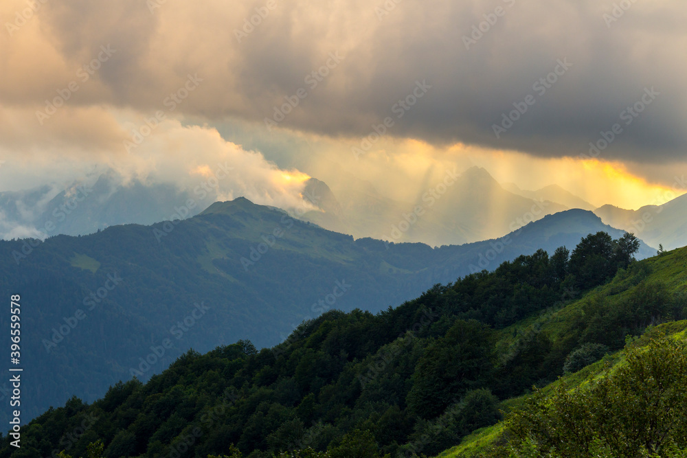 Obraz premium Beautiful mountain landscape at Caucasus mountains with clouds and sky