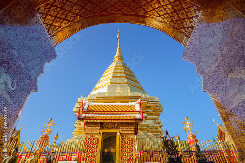 Wat Phra That Doi Suthep Pagoda most famous temple in Chiang Mai, Thailand. n old temple decorated with beautifully carved gold carvings photo