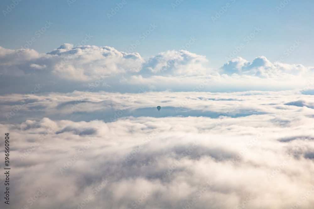 Hot Air Balloon Far in the Clouds