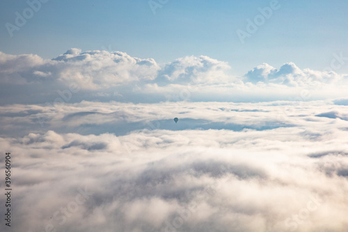 Hot Air Balloon Far in the Clouds © Laura