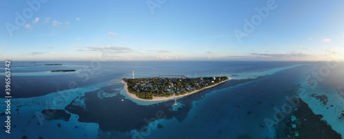 Aerial Panorama Islands indian ocean (maldives) with pristine coral reef