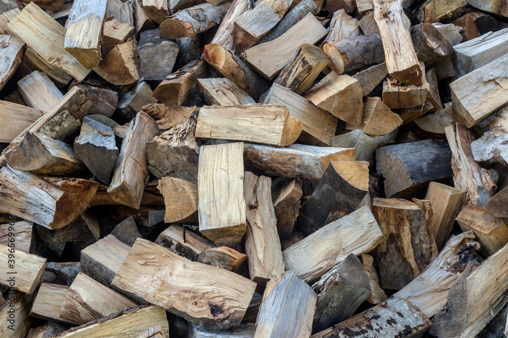 Abstract wooden texture of firewood (background) Abstract wooden texture of firewood (background)