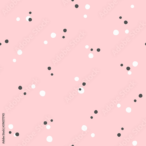 Scattered small dots. Cute seamless pattern. Simple vector illustration.