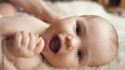 mom woman hugs hugging kissing kisses laughing smiling baby toddler