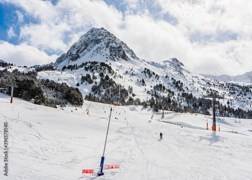 Ski resort GrandVallira. Views of the Pyrenees mountains. Ski cabins with skiers. Rest with the whole family and friends. Andorra