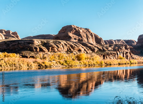 Red Rock Cliffs Reflecting On The Lower Colorado River, Potash Road, Moab, Utah, USA