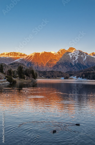 Sunset at the swiss Lake St.Moritz photo