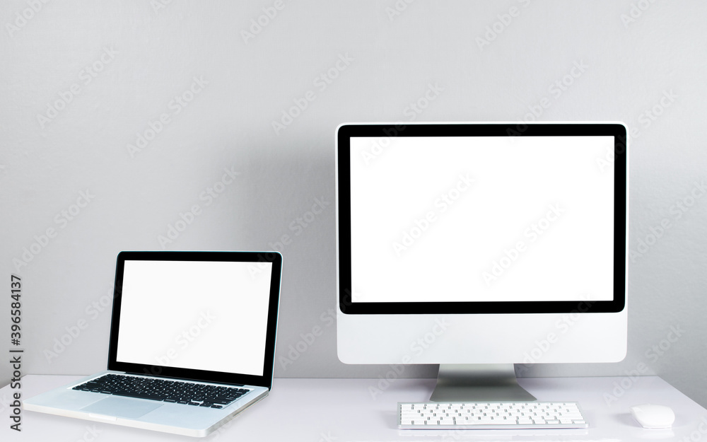 Computer monitor isolated on white screen on office style desk.. Computer monitor isolated on white screen on office style desk..
