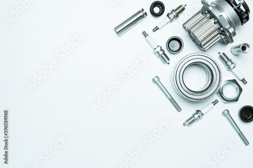 Vehicle parts. Auto motor mechanic spare or automotive piece on white background. Set of new metal car part. Repair and vehicle service with space for text.