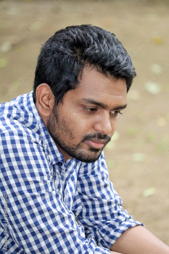 Handsome man Portrait of sad, worried or depressed outdoors thinking Handsome man Portrait of sad, worried or depressed outdoors thinking