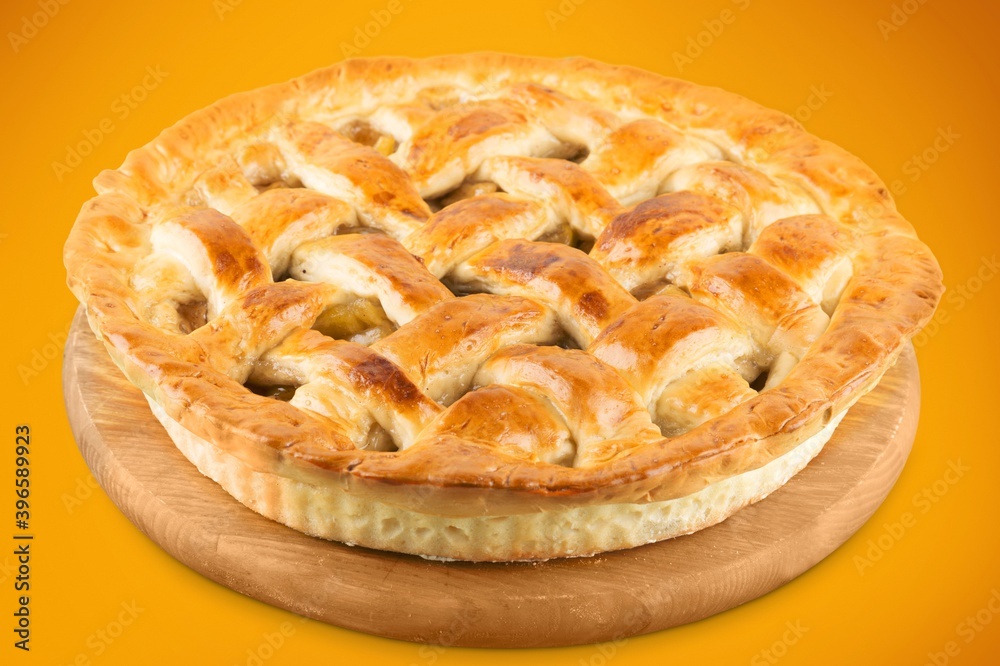 Delicious baked sweet pie on desk Delicious baked sweet pie on desk