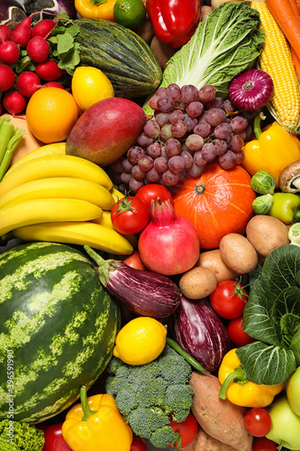 Assortment of organic fresh fruits and vegetables as background  closeup