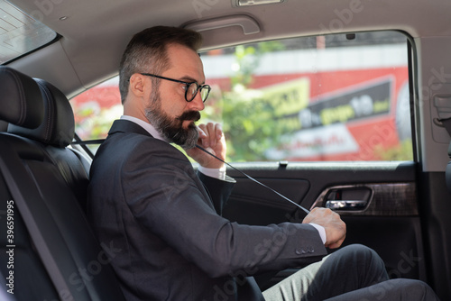 man driving a car