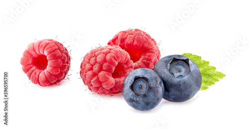 Blueberries with raspberries on White Background. Ripe berries isolated.