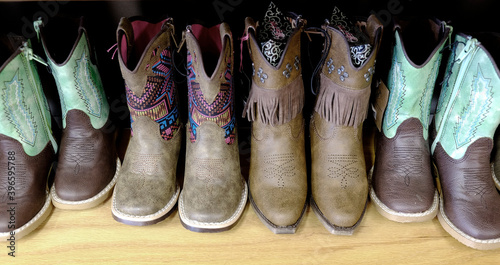 Colorful Cowboy Boots on Shelf Fashion Shoes