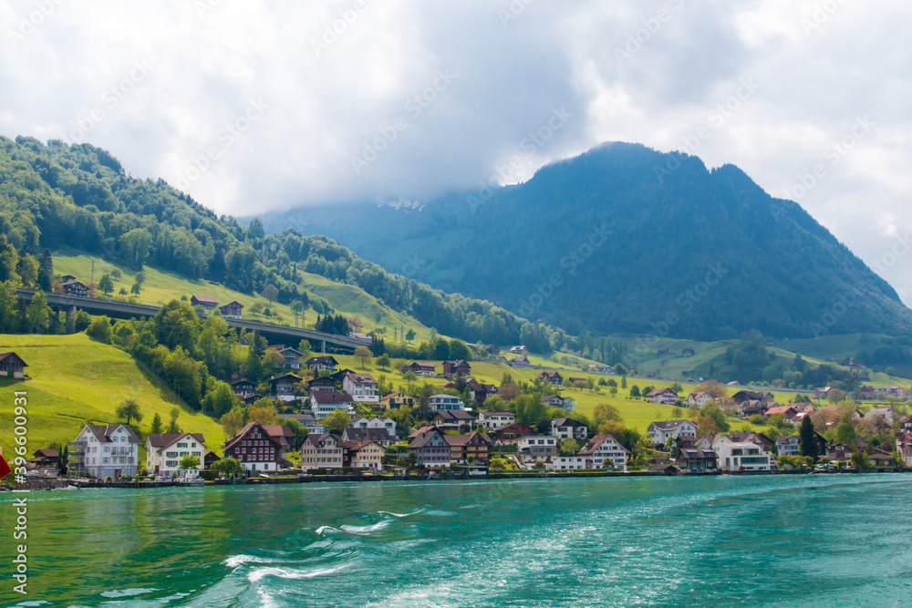 Switzerland.  Landscape with lake Lucerne, small villages  and Alps mountains.