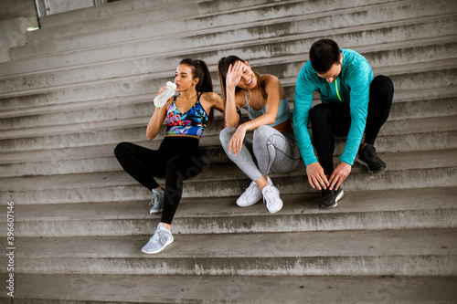 Young people resting during...