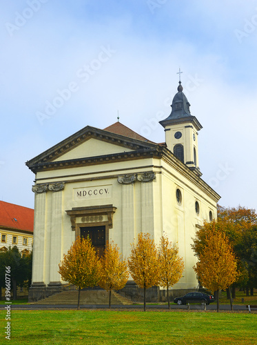 Terezin, Czech Republic - The main square and church of fortress town. Terezin is a former military fortress composed of citadel and adjacent walled garrison town photo