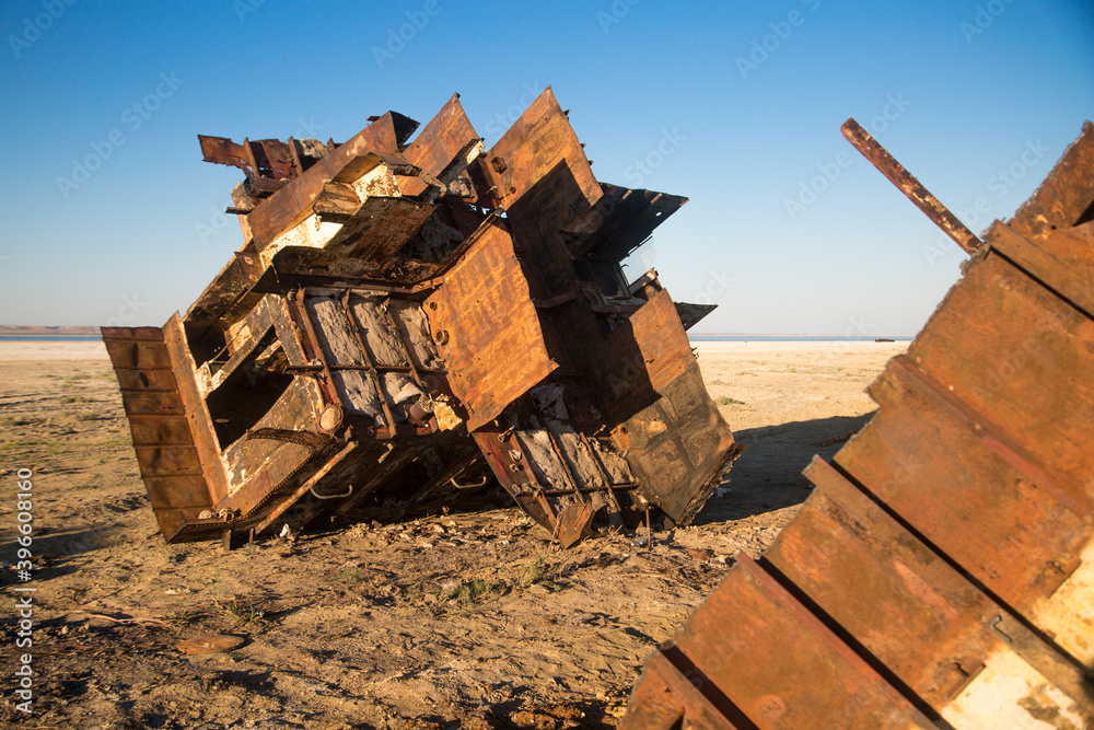 ecological disaster, the remains of a ship on the dry bottom of the Aral Sea ecological disaster, the remains of a ship on the dry bottom of the Aral Sea