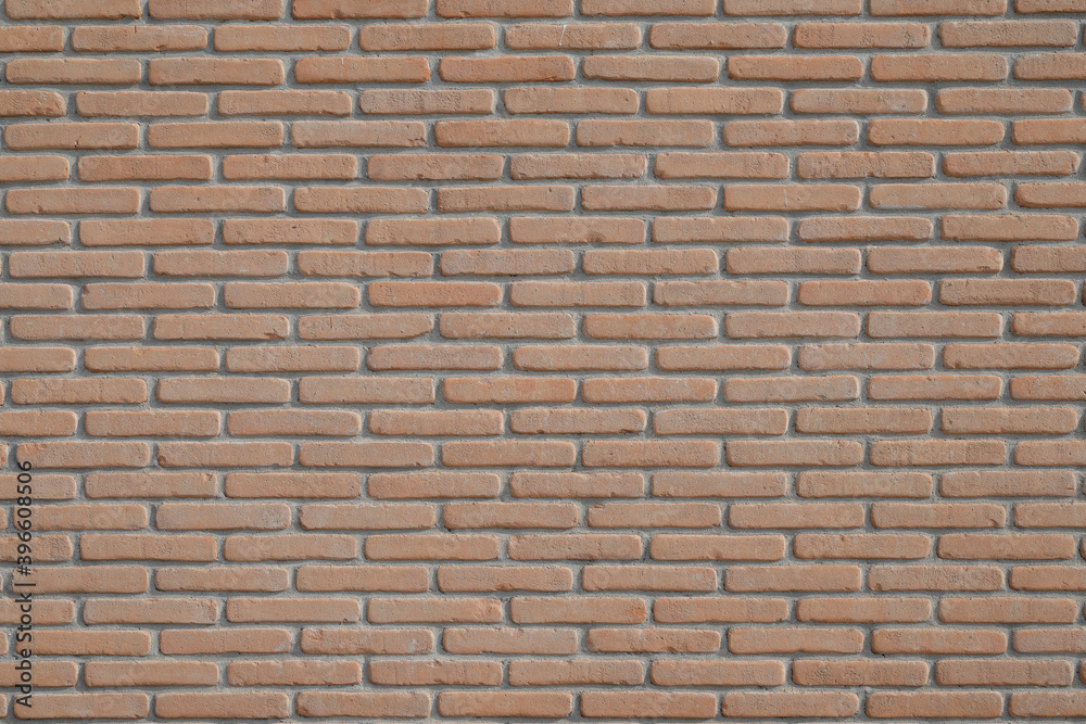New red brown brick wall with cement even, bricklayer for a backdrop with space for text, no person New red brown brick wall with cement even, bricklayer for a backdrop with space for text, no person