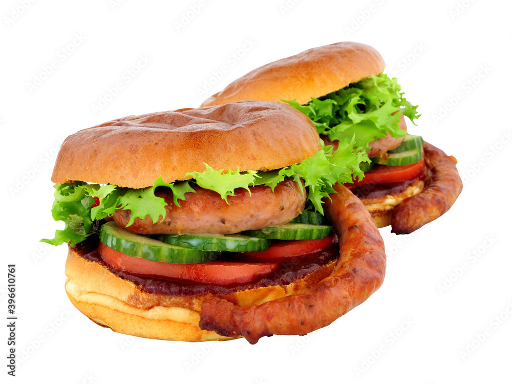 Cumberland sausage and salad sandwiches with barbecue sauce in a brioche bread rolls isolated on a white background Cumberland sausage and salad sandwiches with barbecue sauce in a brioche bread rolls isolated on a white background