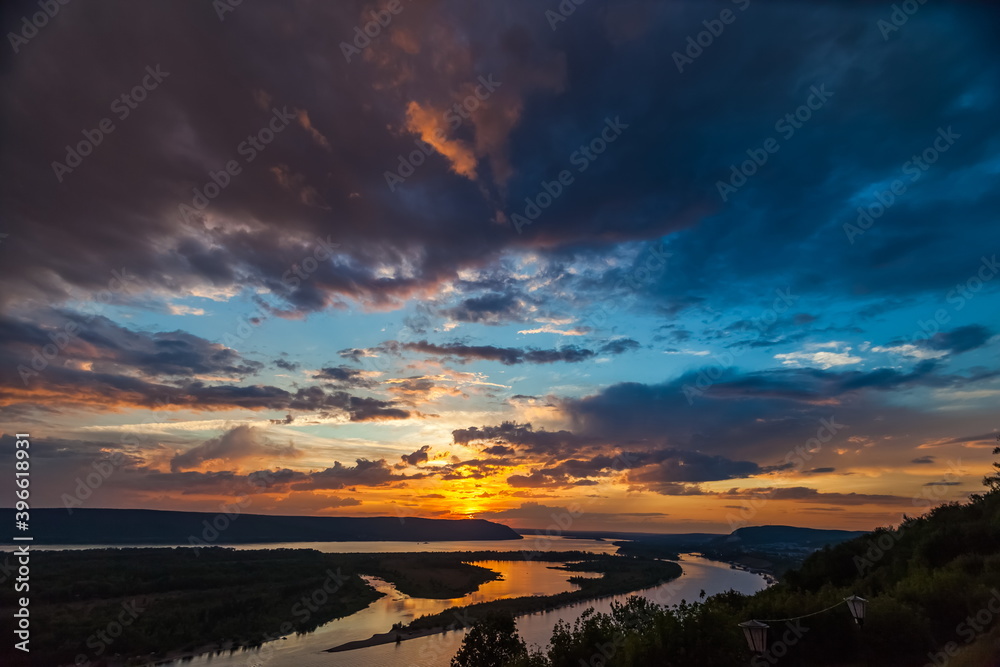 Obraz premium Landscape with sunset on the river in summer