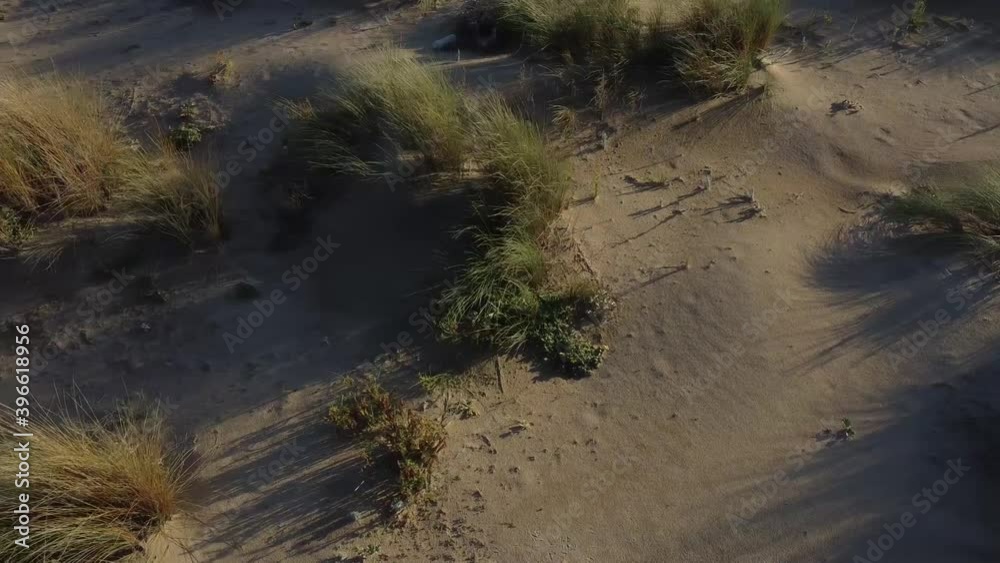 drone flight over de sand dunes at the beach drone flight over de sand dunes at the beach