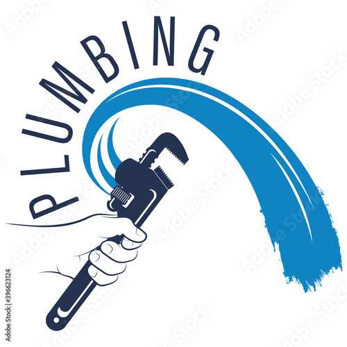 Wrench in hand repair and service symbol for plumber